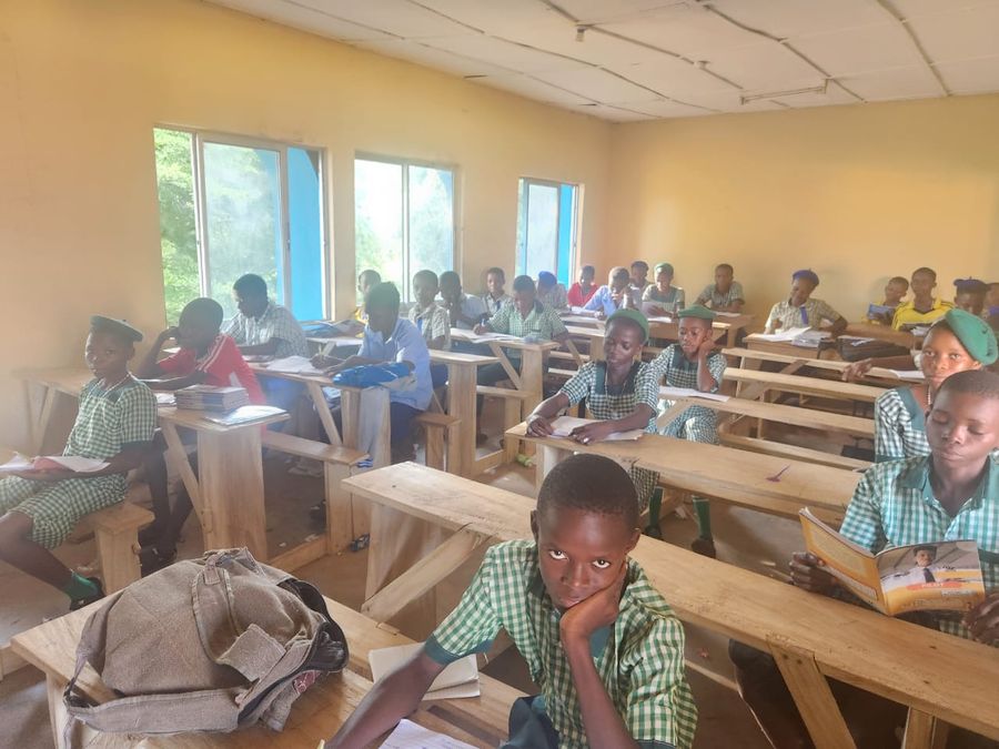 Pupils at their desks in a classroom