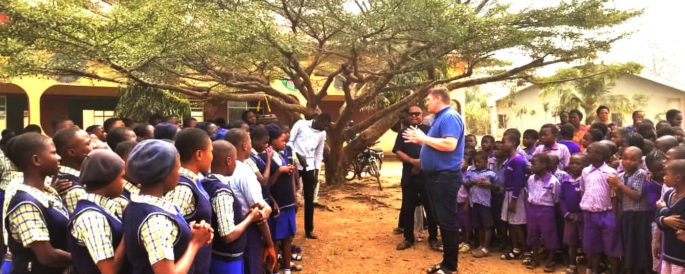 Pupils lined up outside their school